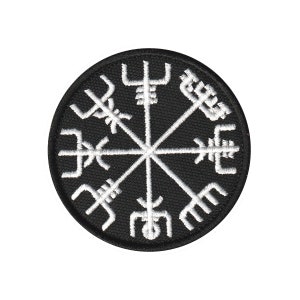 Peut inclure: Un écusson brodé noir et blanc représentant une boussole circulaire à huit points. La boussole est entourée d'un cercle noir avec un contour blanc.