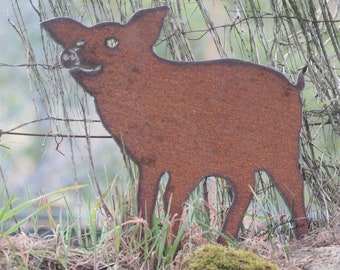 Silhouette of a handmade rusty steel pig 28x32cm x 1.5mm.