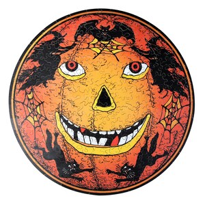 Rundes Holzpuzzle mit Halloween-Dekoration