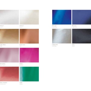 May include: A color chart showing various shades of fabric, including white, beige, gold, pink, red, and green. The chart is labeled "Basic Satin".