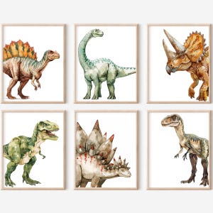 May include: A set of six framed wall art prints featuring watercolor illustrations of dinosaurs. The collection includes a Spinosaurus, a long-necked Brachiosaurus, a horned Triceratops, a Tyrannosaurus Rex, a Stegosaurus, and a Velociraptor.