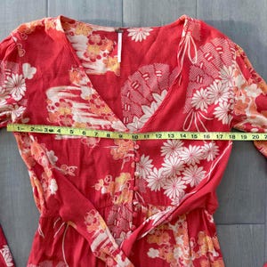 Sukienka midi Free People w pomarańczowe kwiaty | Rękawy dzwonkowe, rozmiar S zdjęcie 5
