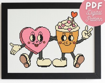 Puede incluir: Patrón de punto de cruz enmarcado con un corazón rosa y una taza de café, ambos con caras y extremidades de dibujos animados. La taza de café está cubierta con crema batida y corazones. El texto "PDF Digital Pattern" está en un círculo rosa.