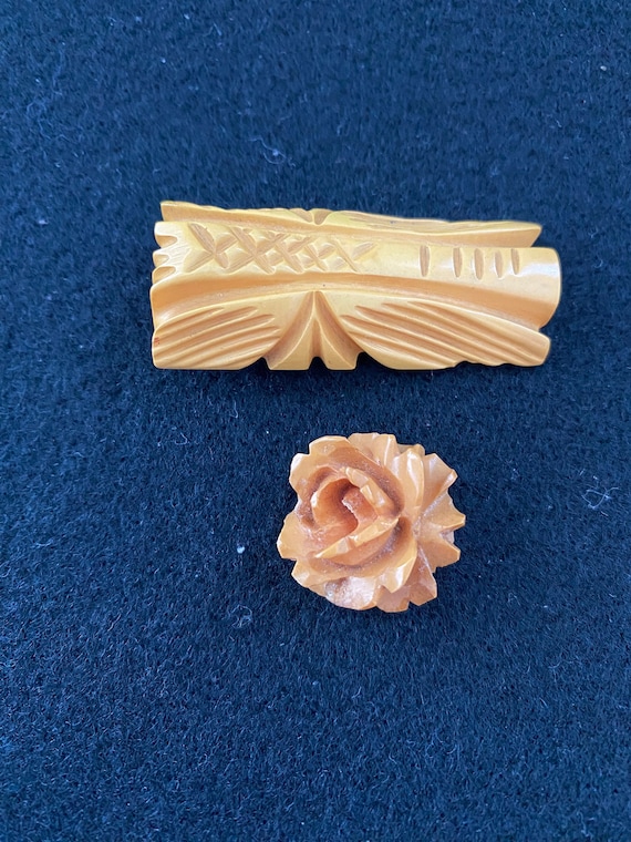 Carved Bakelite clip and carved Bakelite flower p… - image 1