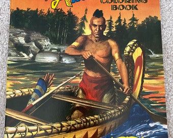 May include: Vintage "Indians of America" colouring book. The cover shows a Native American man in a canoe on a river, with an orange sky backdrop. The text reads "A Coloring Book". Published by Saalfield.