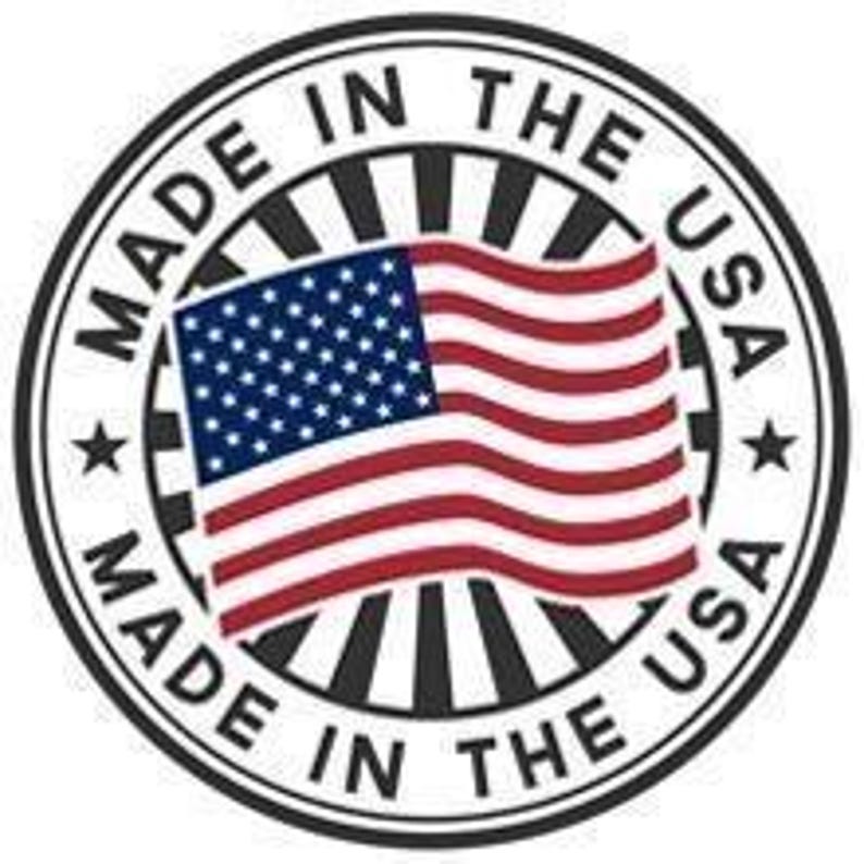 May include: A red, white, and blue American flag with the words "Made in the USA" printed around the perimeter of a circular design.