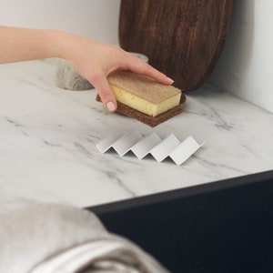 Herramientas de limpieza del hogar Estropajos Almohadilla de esponja con  colgador de pared - China Almohadilla de esponja y estropajos precio