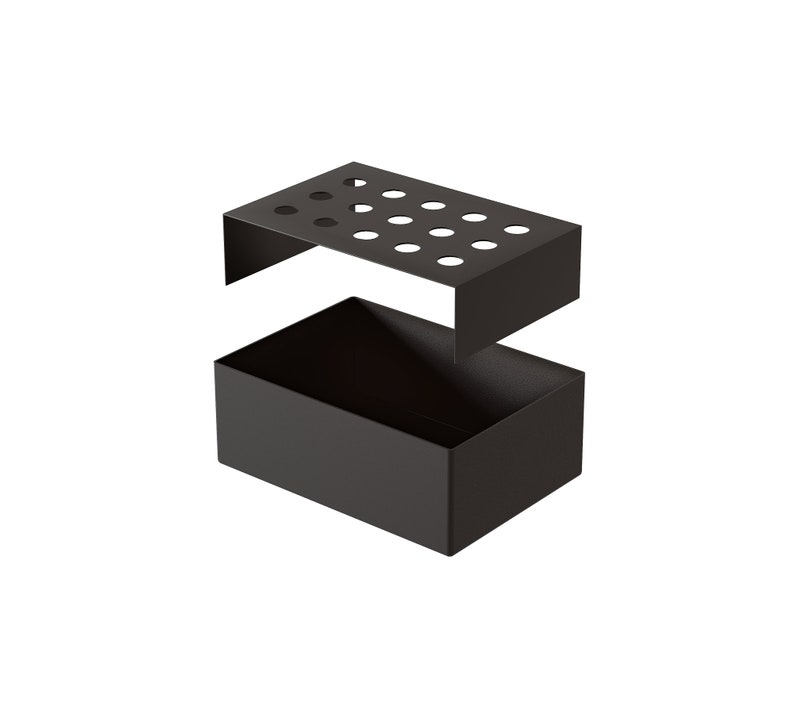 May include: Black metal organizer with a removable top section. The top has a grid of holes for holding items like pens or pencils. The bottom section is a rectangular box.