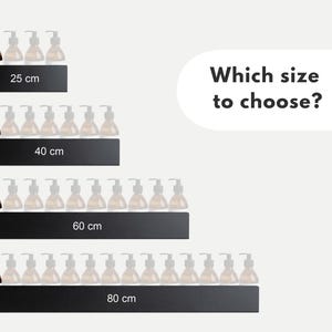 May include: Four different sizes of black metal shelves with rows of clear glass bottles with pumps. The shelves are labeled with the following measurements: 25 cm, 40 cm, 60 cm, and 80 cm. The text "Which size to choose?" is displayed above the shelves.