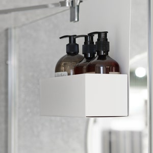 White bathroom caddy hanging on the shower glass modern shower shelf storage cosmetics in the shower floating shower shelf minimalist style image 2