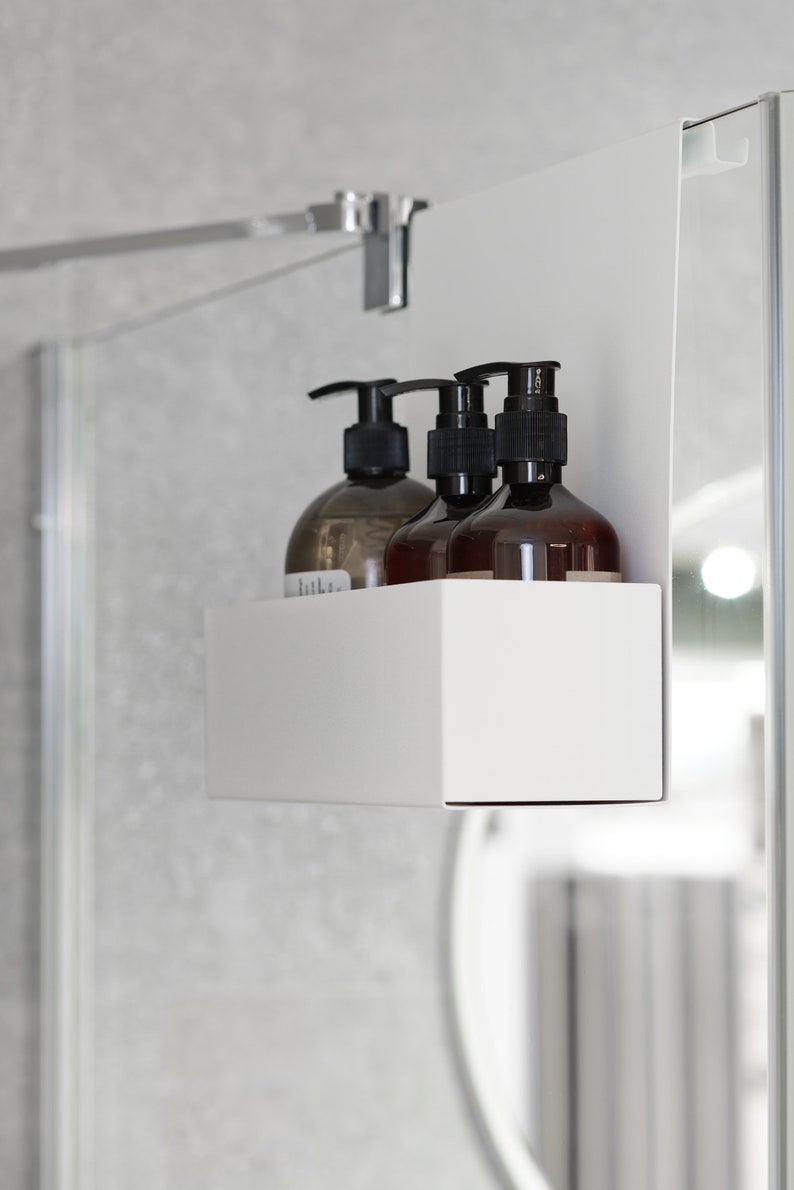 White bathroom caddy hanging on the shower glass modern shower shelf storage cosmetics in the shower floating shower shelf minimalist style image 2