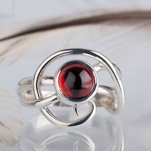 Sterling silver natural red garnet twisted ring