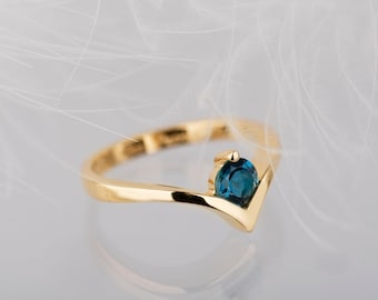 18K yellow gold London blue topaz engagement ring