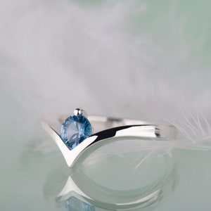 Sterling silver lab created aquamarine chevron ring