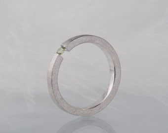 Sterling silver peridot tension promise ring