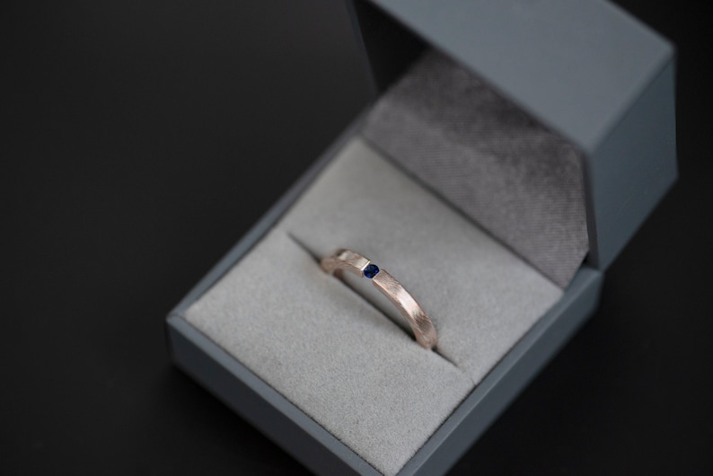 Mokume gane sterling silver and copper round natural blue sapphire tension engagement ring in a jewelry box