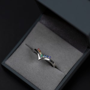 Sterling silver rainbow cubic zirconia enhancer chevron band in a jewelry box