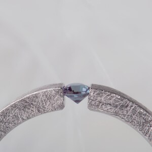 Sterling silver lab created alexandrite tension promise unisex ring