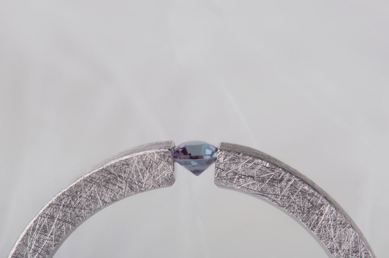 Sterling silver lab created alexandrite tension promise unisex ring