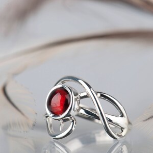 Sterling silver natural red garnet twisted ring