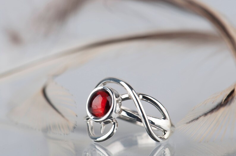 Sterling silver natural red garnet twisted ring