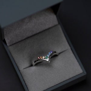 Sterling silver rainbow cubic zirconia enhancer chevron band in a jewelry box