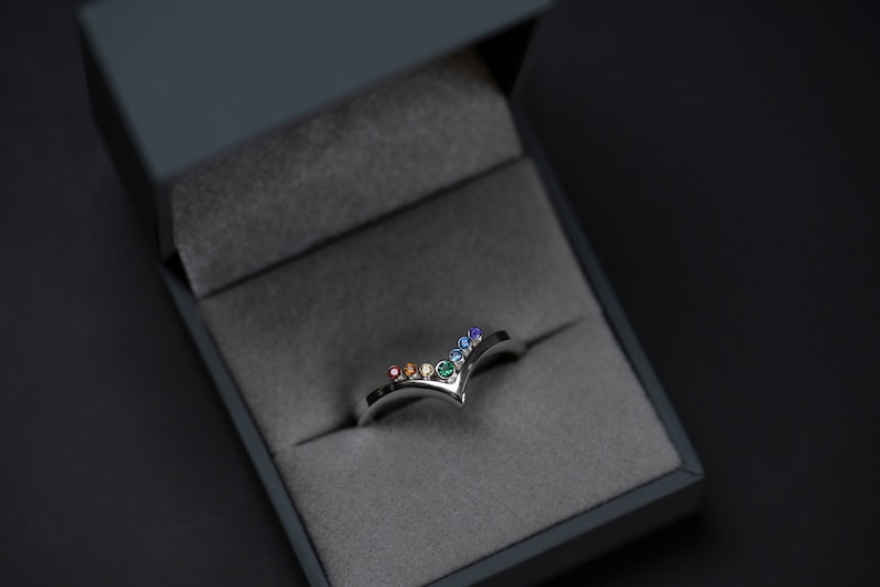 Sterling silver rainbow cubic zirconia enhancer chevron band in a jewelry box