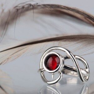 Sterling silver natural red garnet twisted ring