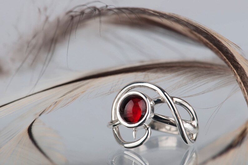 Sterling silver natural red garnet twisted ring