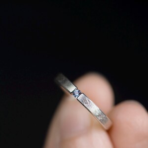 Sterling silver lab created alexandrite tension promise unisex ring