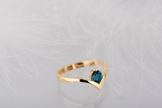 18K yellow gold London blue topaz engagement ring