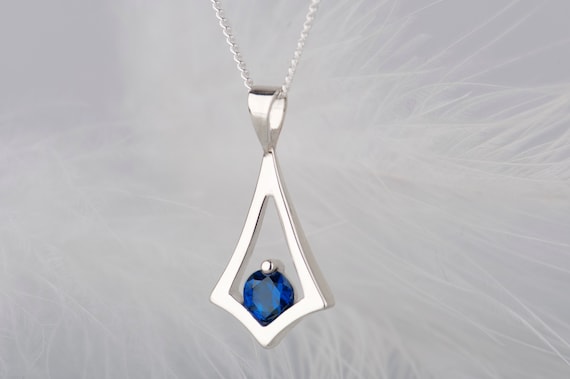 Sterling silver blue sapphire kite pendant necklace