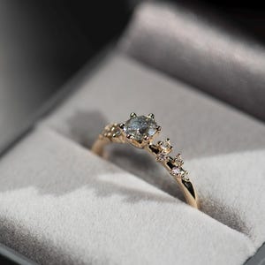 14K gold salt and pepper diamond and white diamonds engagement ring in a jewelry box