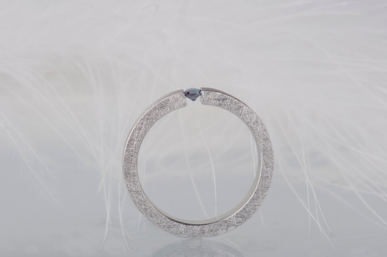 Sterling silver lab created alexandrite tension promise unisex ring