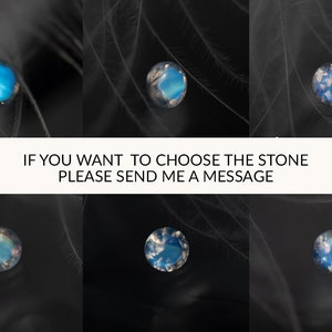 May include: Six iridescent blue and white stones with a cloudy appearance, displayed on a black background.  The text "IF YOU WANT TO CHOOSE THE STONE PLEASE SEND ME A MESSAGE" is displayed below the stones.