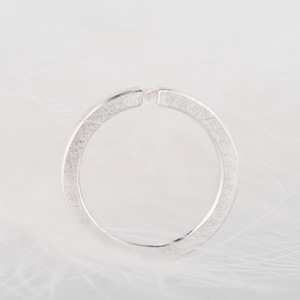 Sterling silver diamond, white sapphire or moissanite tension promise ring