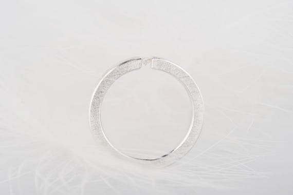 Sterling silver diamond, white sapphire or moissanite tension promise ring
