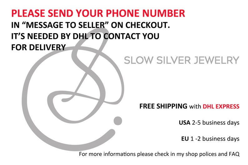 May include: A gray graphic of a stylized letter S with the text "PLEASE SEND YOUR PHONE NUMBER IN "MESSAGE TO SELLER" ON CHECKOUT. IT'S NEEDED BY DHL TO CONTACT YOU FOR DELIVERY" and "SLOW SILVER JEWELRY" in red text. The text "FREE SHIPPING with DHL EXPRESS" is in red text. The text "USA 2-5 business days" and "EU 1-2 business days" is in red text. The text "For more informations please check in my shop polices and FAQ" is in black text.