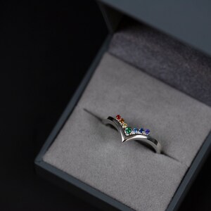 Sterling silver rainbow cubic zirconia enhancer chevron band in a jewelry box