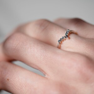 Sterling silver alexandrite chevron band on hand
