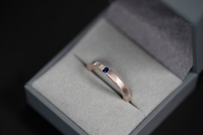 Mokume gane sterling silver and copper round natural blue sapphire tension engagement ring in a jewelry box