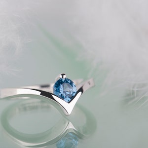 Sterling silver lab created aquamarine chevron ring