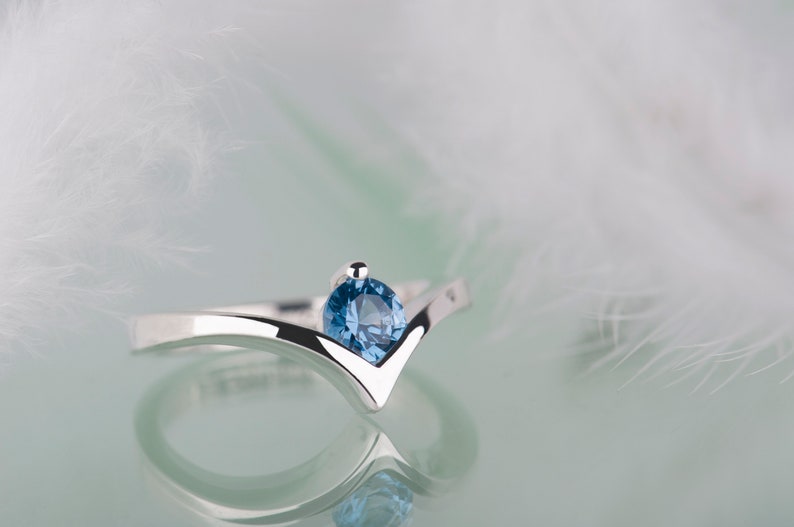 Sterling silver lab created aquamarine chevron ring
