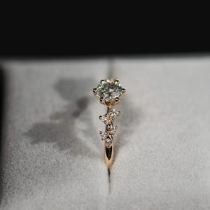 14K gold salt and pepper diamond and white diamonds engagement ring in a jewelry box