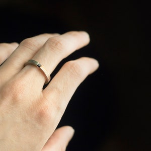 Mokume gane sterling silver and copper round natural blue sapphire tension engagement ring on hand