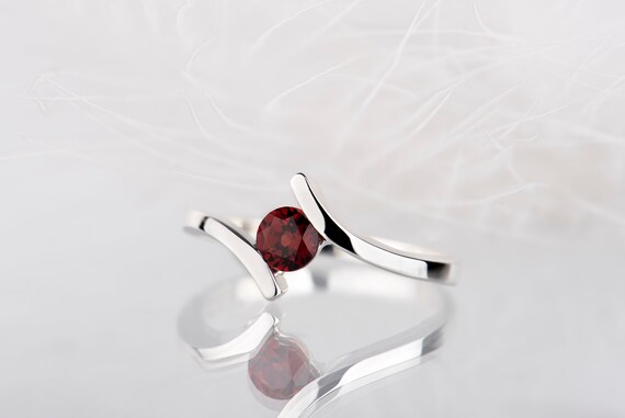 Sterling silver red garnet bypass promise ring