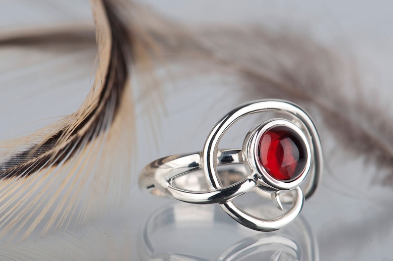 Sterling silver natural red garnet twisted ring