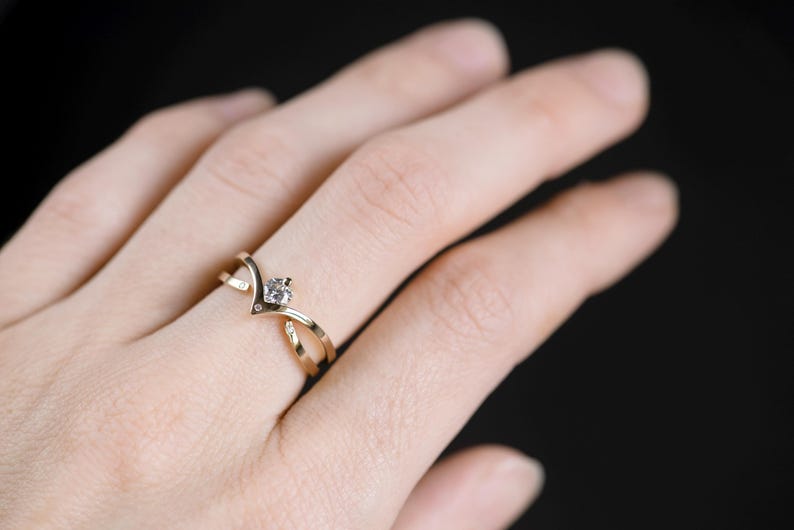 14K yellow gold two little diamonds open curved wedding band and 14K gold diamond chevron ring