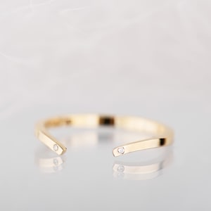 Diamond curved wedding band