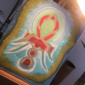 K&ouml;nnte beinhalten: Ein Gem&auml;lde auf Leinwand mit einem roten, wei&szlig;en und gr&uuml;nen Ankh-Symbol in der Mitte. Der Hintergrund ist ein abstraktes Design in Blau, Gr&uuml;n und Gelb.